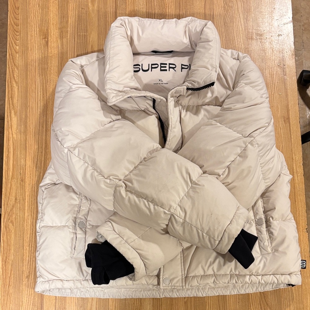 Aritzia The Super Puff Puffer Jacket in Light Cream